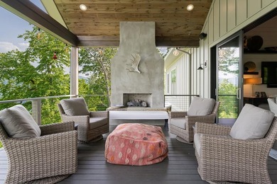 Perched above the pristine waters of Lake Fontana, this - photo 30