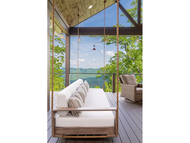 Perched above the pristine waters of Lake Fontana, this - photo 31