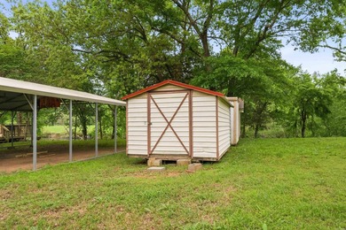 Tucked away in the natural beauty of Royal, Arkansas, this warm - photo 32