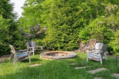 Perched above the pristine waters of Lake Fontana, this - photo 35