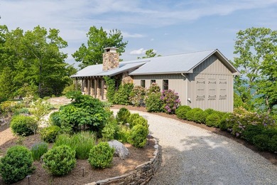 Perched above the pristine waters of Lake Fontana, this - photo 36