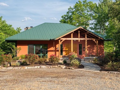 Perched above the pristine waters of Lake Fontana, this - photo 40
