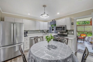 Welcome to this beautifully updated ranch offering the ease of - photo 12