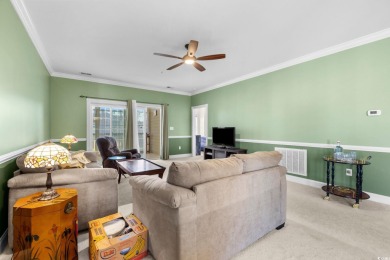 Welcome to refined coastal living in this elegant 3-bedroom