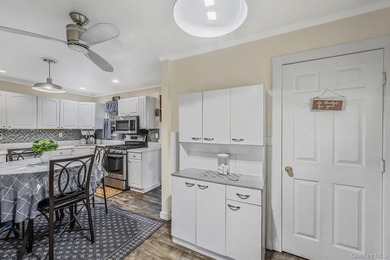 Welcome to this beautifully updated ranch offering the ease of - photo 13