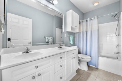 Welcome to refined coastal living in this elegant 3-bedroom