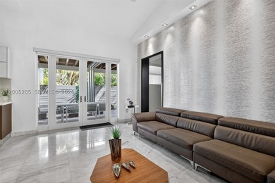 Stunning, fully updated 4-bedroom, 3.5-bath residence located in - photo 17