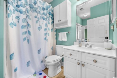 Welcome to refined coastal living in this elegant 3-bedroom