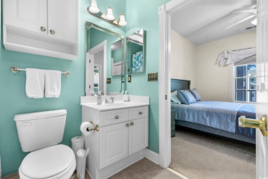 Welcome to refined coastal living in this elegant 3-bedroom