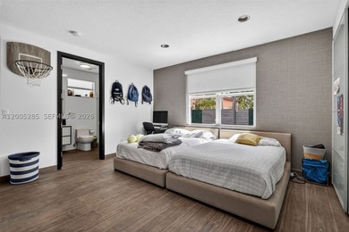 Stunning, fully updated 4-bedroom, 3.5-bath residence located in - photo 27