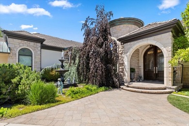 Tucked away on a private, tree-lined lane in Holladay, this - photo 2