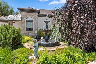 Tucked away on a private, tree-lined lane in Holladay, this - photo 3