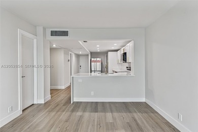 HIGH-FLOOR WATERFRONT RESIDENCE with water and downtown skyline - photo 8