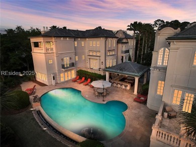 This architectural masterpiece spans two waterfront lots and