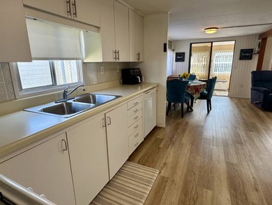 PRICE JUST REDUCED! Charming Updated Mobile Home with Expansion - photo 12