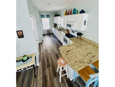 This spacious 4 LARGE Bedroom 4 Bath raised beach house is just - photo 24
