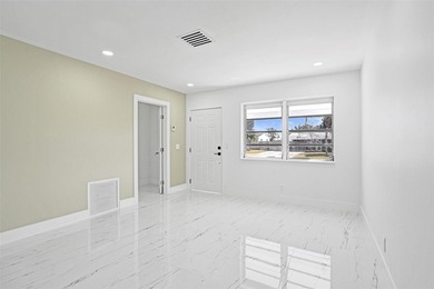 Completely renovated 4-bedroom, 3-bathroom home in desirable - photo 4