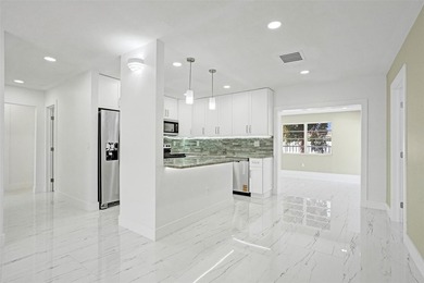Completely renovated 4-bedroom, 3-bathroom home in desirable - photo 5