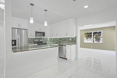 Completely renovated 4-bedroom, 3-bathroom home in desirable - photo 6