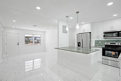 Completely renovated 4-bedroom, 3-bathroom home in desirable - photo 8