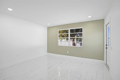 Completely renovated 4-bedroom, 3-bathroom home in desirable - photo 9
