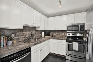 This 2 bedroom, 1.5 bath residence puts you right in the center - photo 3