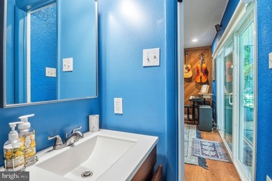 Beautiful, custom-built split foyer home situated on over an - photo 26