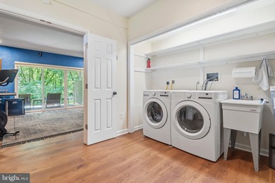 Beautiful, custom-built split foyer home situated on over an - photo 28