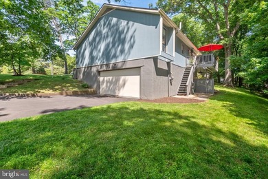 Beautiful, custom-built split foyer home situated on over an - photo 31