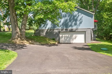 Beautiful, custom-built split foyer home situated on over an - photo 32