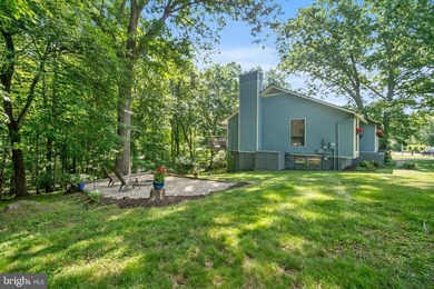Beautiful, custom-built split foyer home situated on over an - photo 34