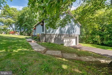 Beautiful, custom-built split foyer home situated on over an - photo 36