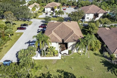 Nestled in the tranquil Seagrass Condominiums, this first-floor - photo 1