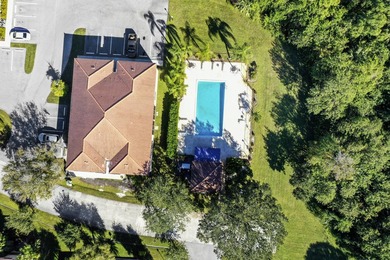Nestled in the tranquil Seagrass Condominiums, this first-floor - photo 3