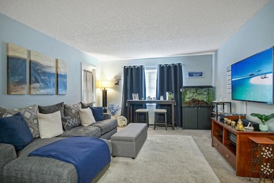 Nestled in the tranquil Seagrass Condominiums, this first-floor - photo 6