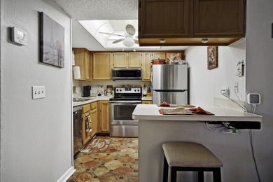 Nestled in the tranquil Seagrass Condominiums, this first-floor - photo 8
