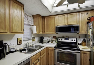Nestled in the tranquil Seagrass Condominiums, this first-floor - photo 9