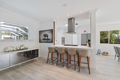 Beautifully reimagined residence in one of South Florida's most - photo 5