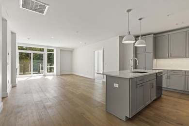 Residence 404 is the final new construction, corner residence of