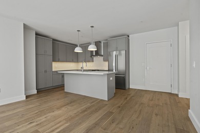 Residence 404 is the final new construction, corner residence of