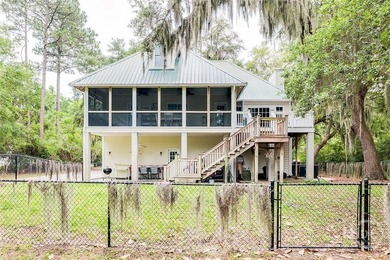 Tucked beneath swaying oaks and draped in coastal charm, 3120 - photo 50