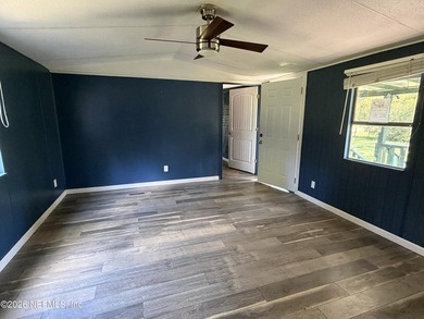 Come view this mobile home situated on a fenced, corner lot - photo 3
