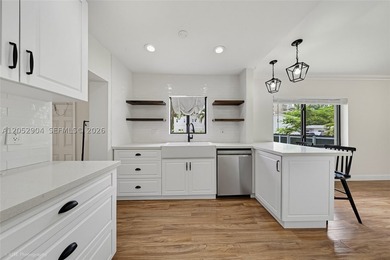 This beautifully maintained 3-bedroom, 2-bath residence offers a - photo 5