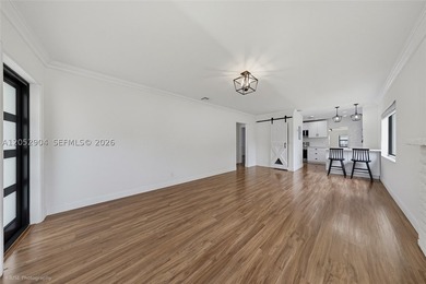 This beautifully maintained 3-bedroom, 2-bath residence offers a - photo 8