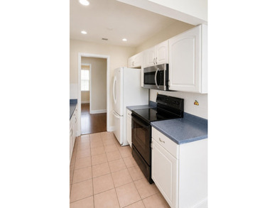 This well-maintained 3-bedroom, 2-bath home offers a bright - photo 10