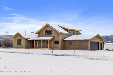 Lake Home For Sale in Victor, Idaho