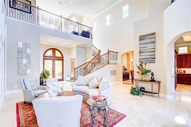 Welcome to this stunning Tuscan-inspired estate featuring an - photo 4