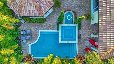 Welcome to this stunning Tuscan-inspired estate featuring an - photo 6