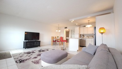 Gorgeous, updated condo on the top level of this four-story