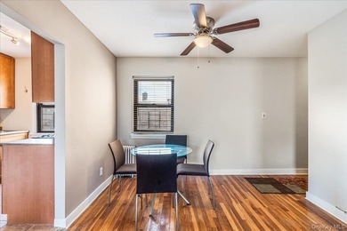 Welcome to this charming top-floor, one-bedroom walk-up located - photo 4